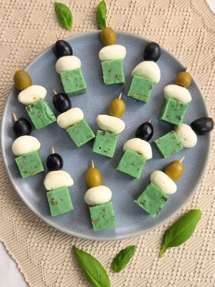 cheese and olive skewers with mozzarella and basil cheese